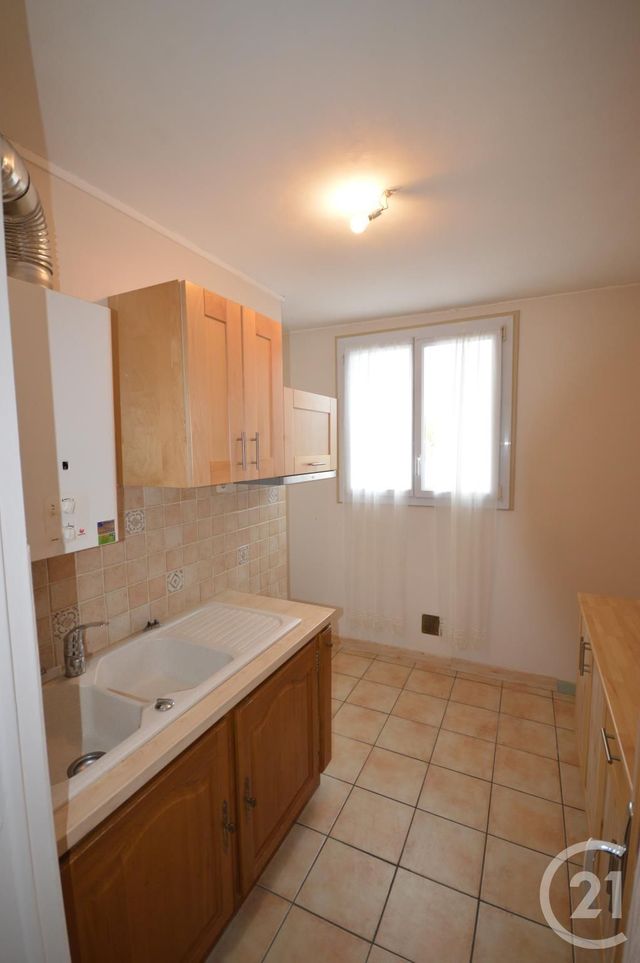 Afficher la photo en grand Appartement F4 à vendre - 4 pièces - 66.4 m2 - ST JEAN DE LA RUELLE - 45 - CENTRE - Century 21 Premium